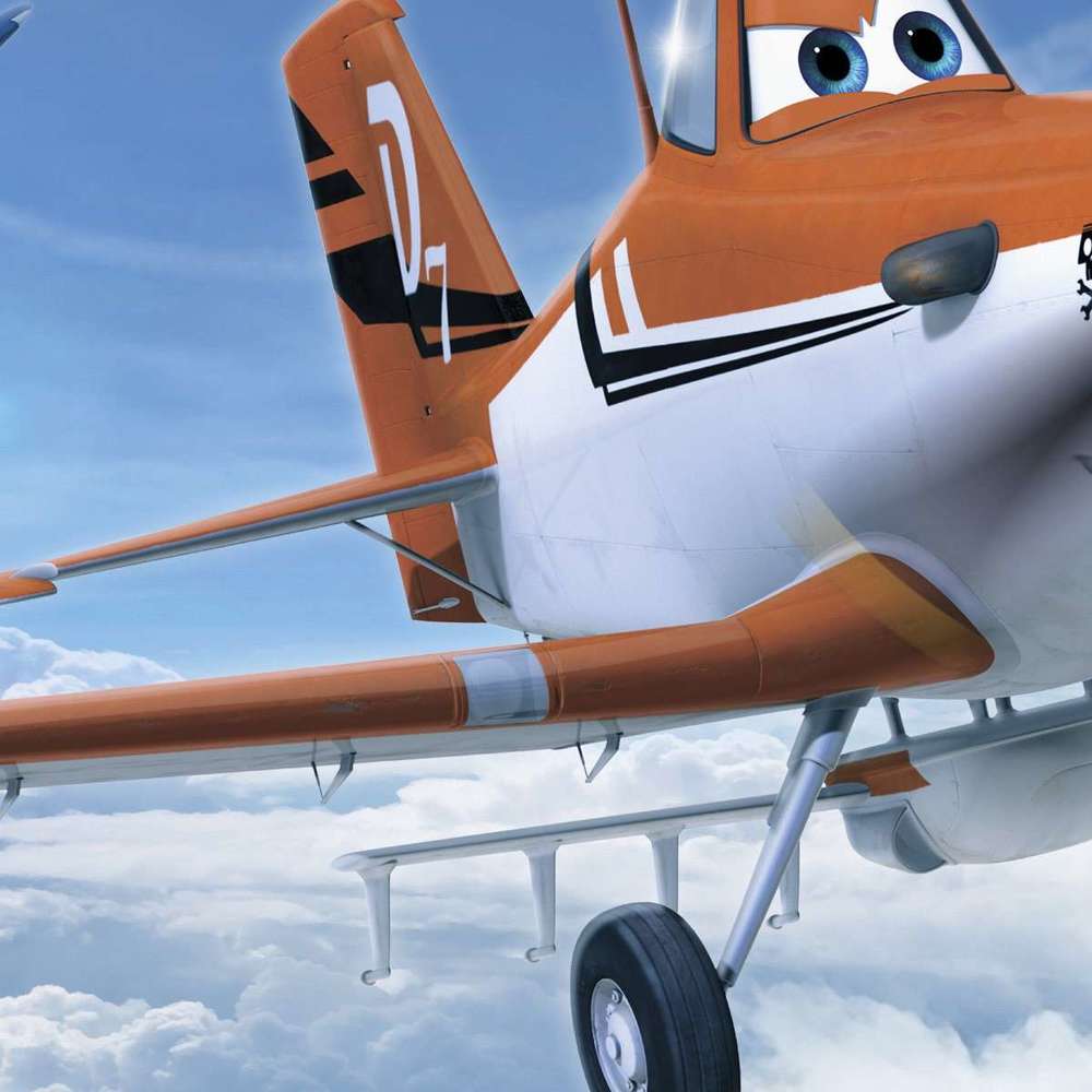 Behang Komar Disney Planes Above The Cloud